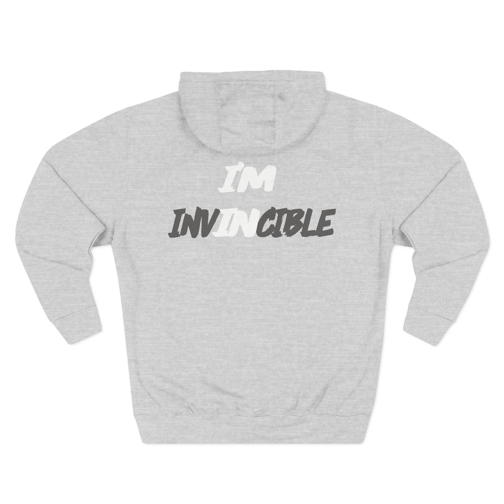 “I’m Invincible” motivational text design on black unisex hoodie