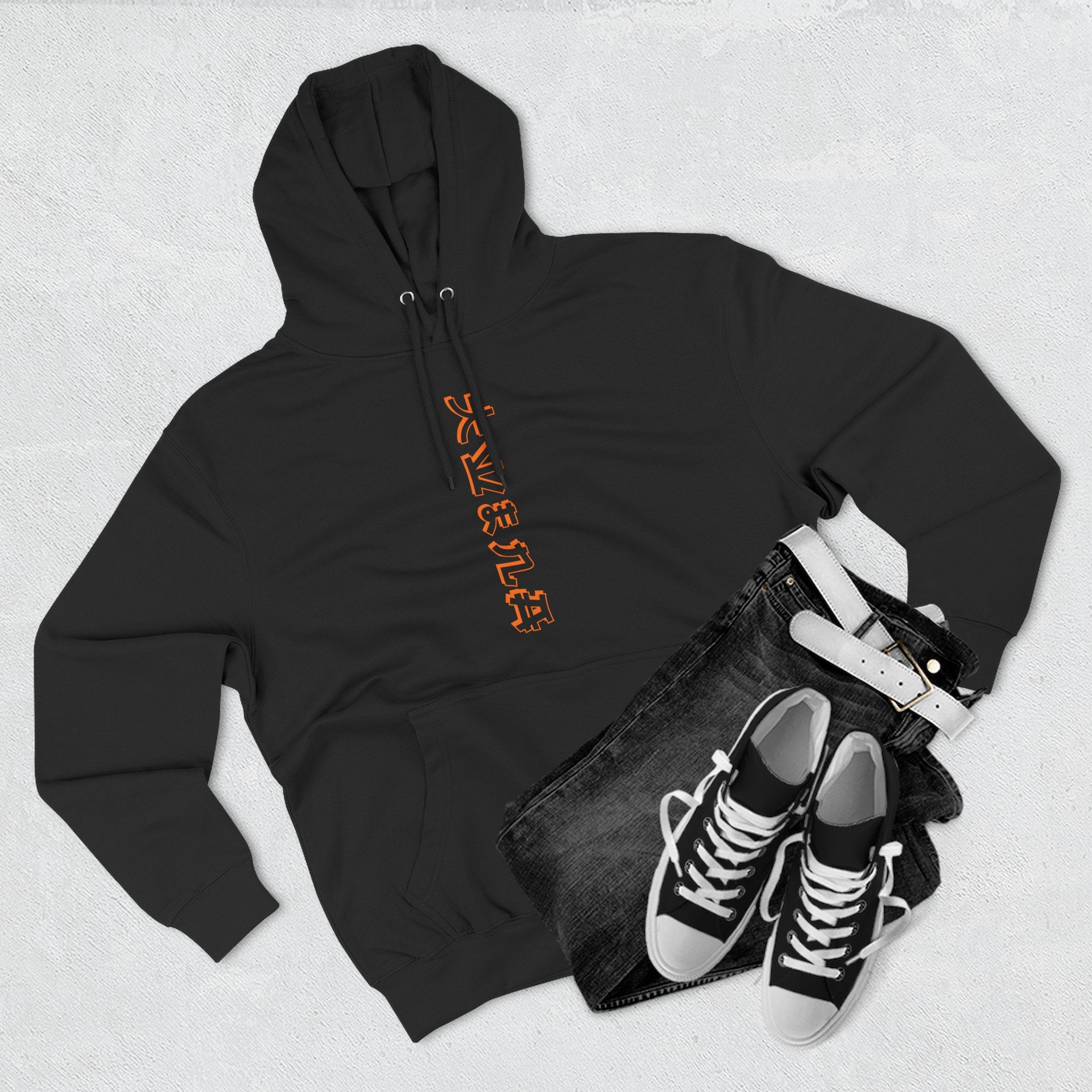 Minimalist black sweatshirt featuring bold orange and white print.